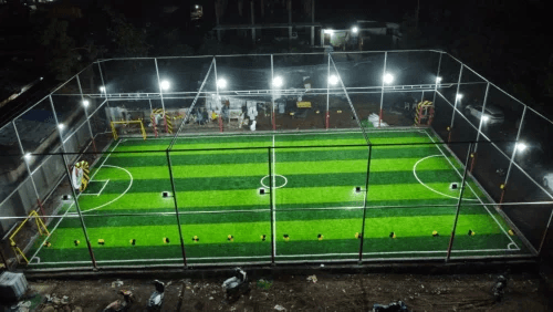 Floodlit cage pitch at night